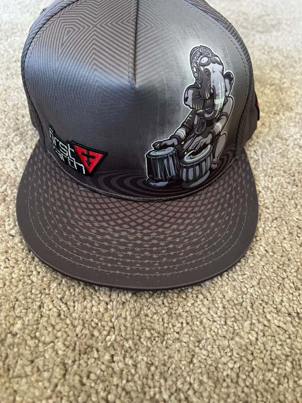 First Earth Snapback Hat Brown Ganesha Playing Tabla Graphic